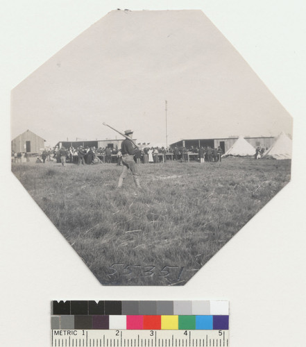 [Soldier on patrol at camp. Unidentified location.]