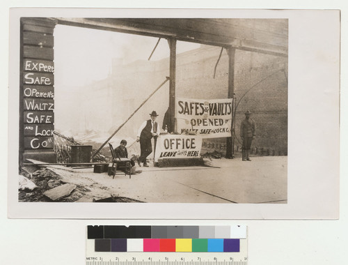 [Waltz Safe and Lock Co. Staff and soldier on guard in ruined building. Unidentified location.]