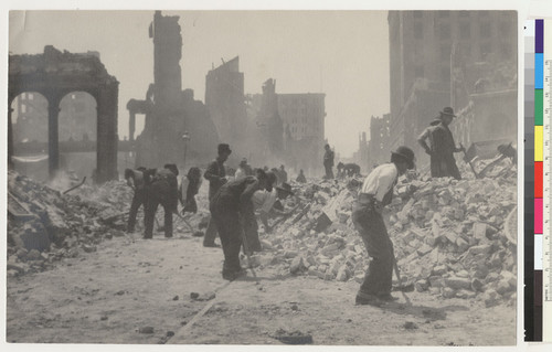 [Men clearing rubble from street. House cleaning day, March 3, 1907? Unidentified location.]