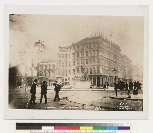 Showing S.E. cor. 1st [First] Market. April 18th, 1906. S.F. Cal. [Donahue Labor statue at Bush and Battery Sts., center. Fire burning at left.] [M. Behrman Collection. No. 61F.]
