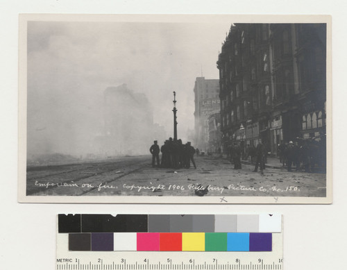 Emporium on fire. [verso:] April 18, Market next to Phelan Bldg. E.Q. see the store windows, broken & see the small bldg. along side of Phelan Bldg. injured by E.Q. No. 150.]