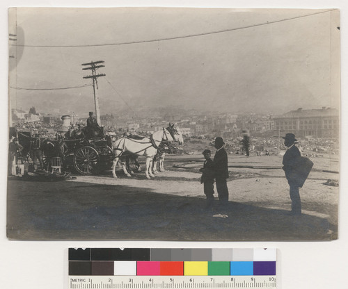 The engine that put out the fire in the Mission District. 1906. [Firefighters posing with fire engine.]