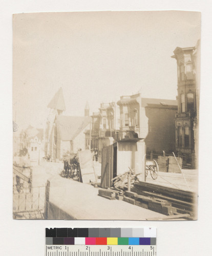 Street [?], houses destroyed by earthquake. [First Unitarian Church at Geary and Franklin in distance.]