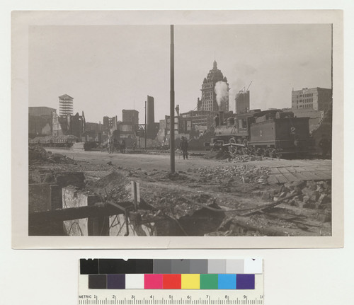 Taking debris from heart of city by rail. [Call Building in distance, right center.]