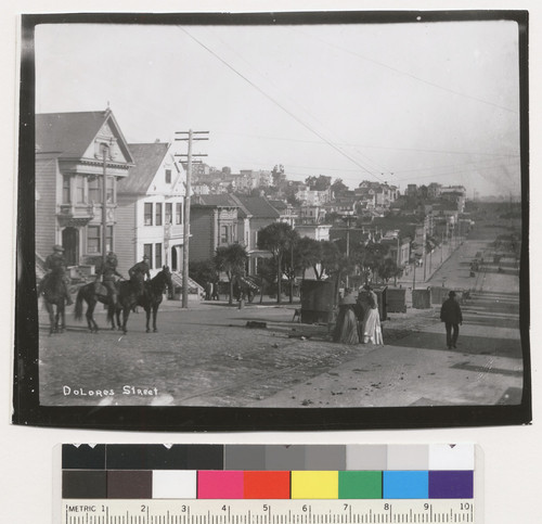 Dolores Street. [View along street showing soldiers on horseback and street kitchens.]