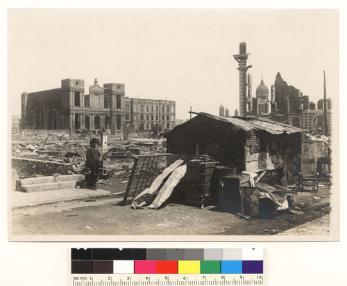 Van Ness? (& Hayes). [Makeshift refugee shelter. Ruins of St. Ignatius Church & College in distance, left.]