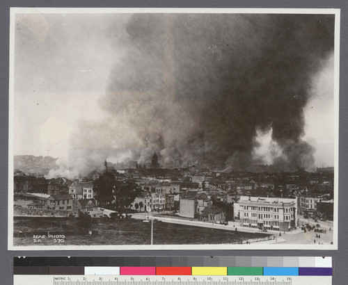 [View of fire in distance, looking northeast from near Market and Buchanan Sts.]