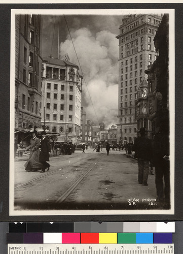 [View down Geary toward Market and Thirds Sts. with fire in distance.]