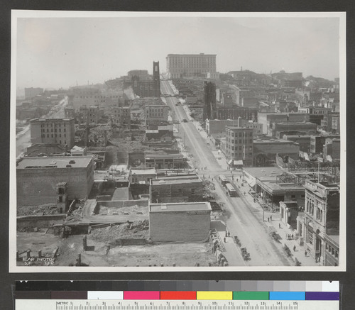 [View west on California St. toward Nob Hill and Fairmont Hotel during reconstruction. From Merchant's Exchange Building?]