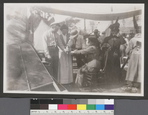 [Woman receiving first aid. Golden Gate Park.]