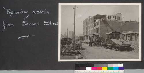 Removing debris from Second Street