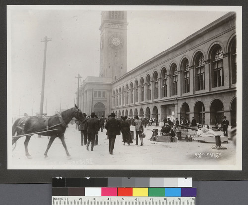 [Street scene of refugees with belongings at Ferry Building.]