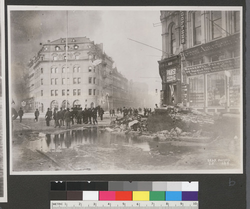 [Street scene of broken water main at California and Market Sts.]