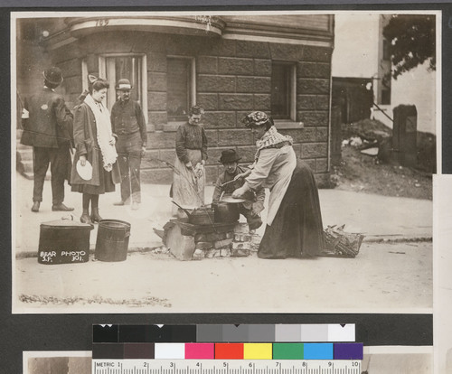 [Refugees at street kitchen. Unidentified location.]