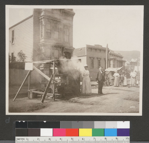 [Families posing at street kitchens. Unidentified location.]