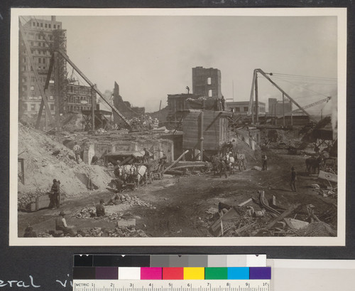 One year after. Workmen cleaning debris from the Palace Hotel excavation