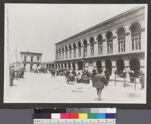 [Street scene of refugees at Ferry Building.]