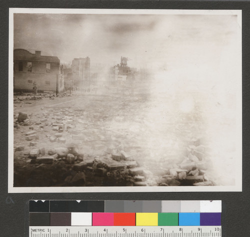 [Smouldering ruins near Washington St. (left). Hall of Justice in distance, center.]