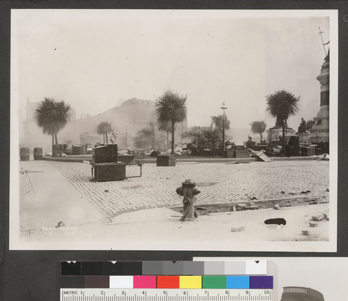 [Scattered belongings in street near near City Hall.]
