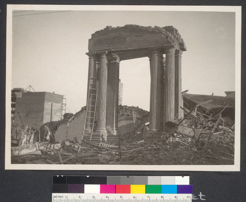 One year after. The Market Street entrance to the Palace Hotel, after going through quake, fire and dynamiting, refused to fall even when the big walls were pulled down from about it