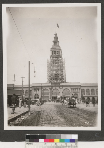 [Ferry Building during reconstruction. From foot of Market St. at Sacramento St.]