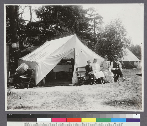 [Refugee family posing before tent. Refugee camp, Golden Gate Park?]