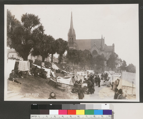 [Refugee camp, Jefferson Square. Lutheran Church, background.]