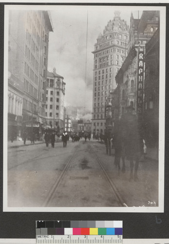 [View south along Kearny St. toward Market during fire. Call Building, right center.]