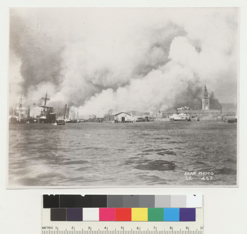 [View of city burning from San Francisco Bay. Ferry Building, right.]