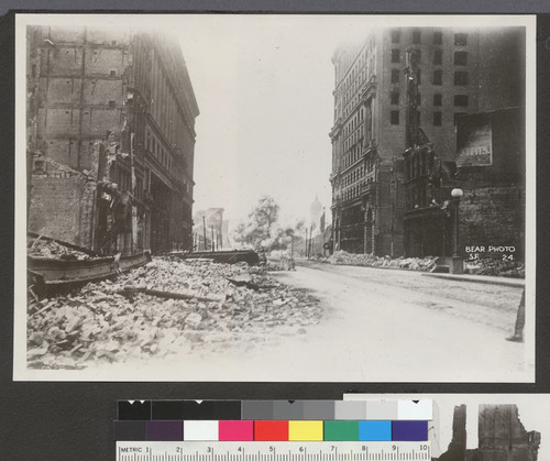 [Razing of building? Market St. looking southwest from near Fourth St. Emporium department store, left; Flood Building, right.]