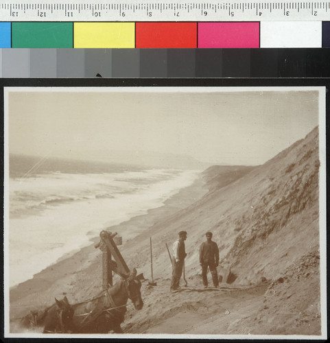 Digging out buried steam shovel. [Ocean Shore Railway. Unidentified location.]