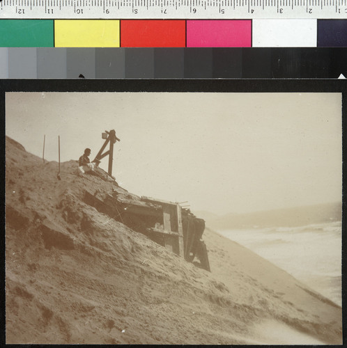 [Debris buried in coastal landslide. Along Ocean Shore Railway. Unidentified location.]