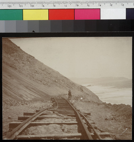 Ocean Shore track, under landslide. [Ocean Shore Railway, unidentified location.]