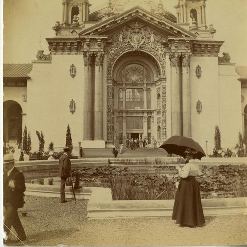 Woman with umbrella, Court of Lilies pond, Machinery and Transportation Building