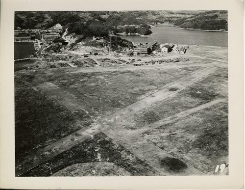 Airstrip of mowed grass at V.M.O. 5 Seaplane Base, Sasebo