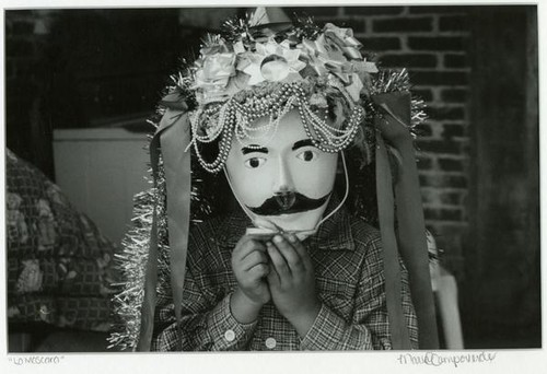 [Man with mask made in San Juan Nuevo]