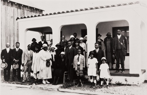 A gathering at a Santa Barbara home in 1926 ; civic leader Pearl Chase is standing third from right