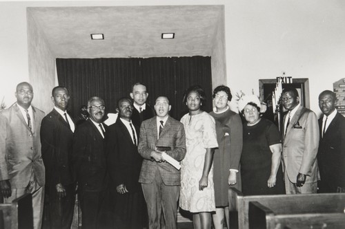 Bethel A.M.E. Church Board of Trustees, Oxnard : 1967 ; l. to r. Will Brown, Clinton Strozier, Hesterly Hankins, A. J. Towler, Clinton Tatum, Rozell Gaines, Tempest Holloway, Adele Pinkard, Walter Reddick, Garvey Wilson. Standing in back: Reverend C. N. Austin