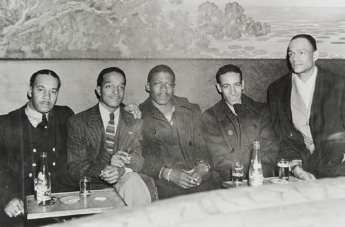 Santa Barbara Servicemen of W. W. II meet at the Chinese Pagoda Restaurant in San Francisco in November 1945 ; l. to r. : C. A. Mickey, George Farmer, "Blue," Charles "Skip" Rhea, and Fox