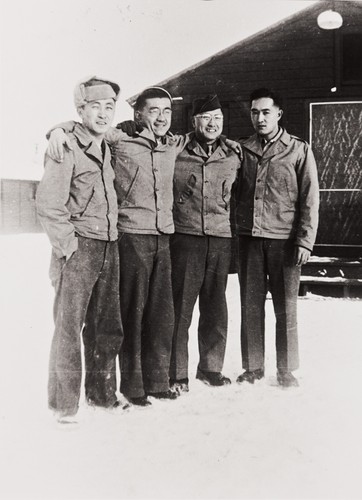 Mr. Nakamura, Sam Rokutani, Mr. Nakamura and Patrick Nagano at Camp Savage, MN. : winter 1942 ; Rokutani and Nagano had been together at Camp 3, Poston Relocation Center ; the four trained at the U.S. Army Military Intelligence School ; Patrick Nagano served in the European theatre of operations in WWII, the other three in the Pacific