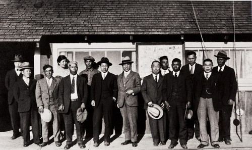 Oxnard Buddhist Church Members : Point Mugu Fish Camp : 1931 ; L-R: Mr. M. Takeda, Mr. Y. Yamashita, Mr. J. Kanamori, Mrs. Kubota, Mr. T. Moriwaki, Mr. Kubota (owner of Fish Camp), two visitors from Japan, Mr. S. Watarida, Mr. Yeto, Mr. K. Iwamoto, Mr. M. Iwamoto, Mr. S. Inouye and Mr. T. Shiozaki