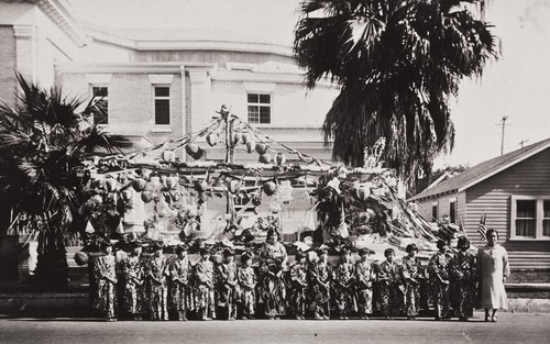 Oxnard Buddhist Church Float : November 1928 ; L-R: Miyoko Takeda, Hideko Mikuriya, Ayako Tagami, Kimi Hashimoto, Mitzie Kanamori, Chiyeko Mikuriya, Masako Moriwaki, Yoshiko Yeto, Mitsue Kanda, Minato Mayeda, Mary Kanamori, Fumiyo Kodani, Fujie Hashimoto, Mitsuye Yeto, and Mrs. Kaniye Sensei