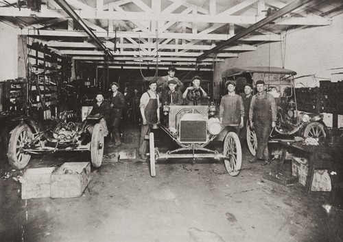 Workers at mechanic shop