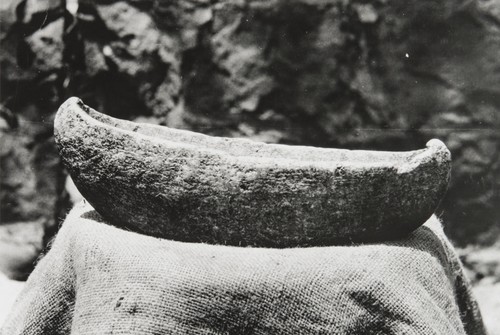 Chumash tomol (boat) effigy made from Catalina Island steatite. Found at Burton Mound (old Potter Hotel site) and presented by Vera Dowell to the Santa Barbara Museum of Natural History