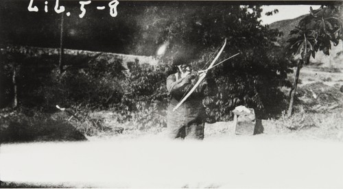 Fernando Librado demonstrating use of bow and arrow : 1913