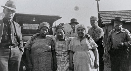 Second from left, Juana ("Jennie") Gardner (née Castelo), Barbareño Chumash, and third from left, Amanda Martínez (née Sosa), Ventureño Chumash, with friends and relatives at Bill Gardner's "Fish Camp" on the Rincon Coast : ca. 1930