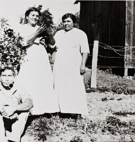 Left to right: Enrique Leyva, Purisimeño Chumash descendant, María Antonia Leyva (née Tumamait), Ventureño Chumash, and María Basilisa Tumamait (née Barrios), Ventureño Chumash : circa 1915 ; probably taken near their homes on North Olive Street, Ventura