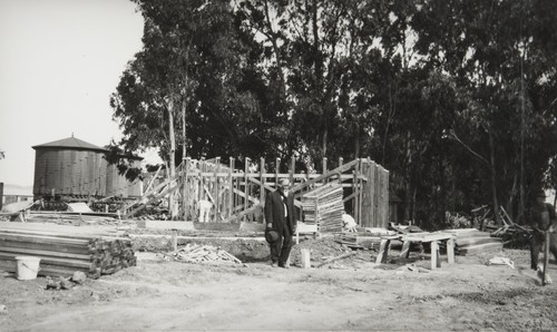 José Peregrino (Winai) Romero, a Ventureño Chumash man, in front of a house under construction, possibly taken near his home on the Camarillo Ranch : 1919