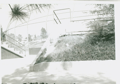 View of the baseball stadium seating and backstop at City Terrace Park