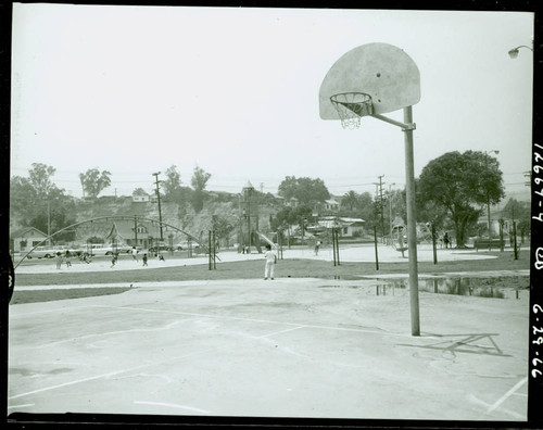 View of the basketball court and playground at Obregon Park